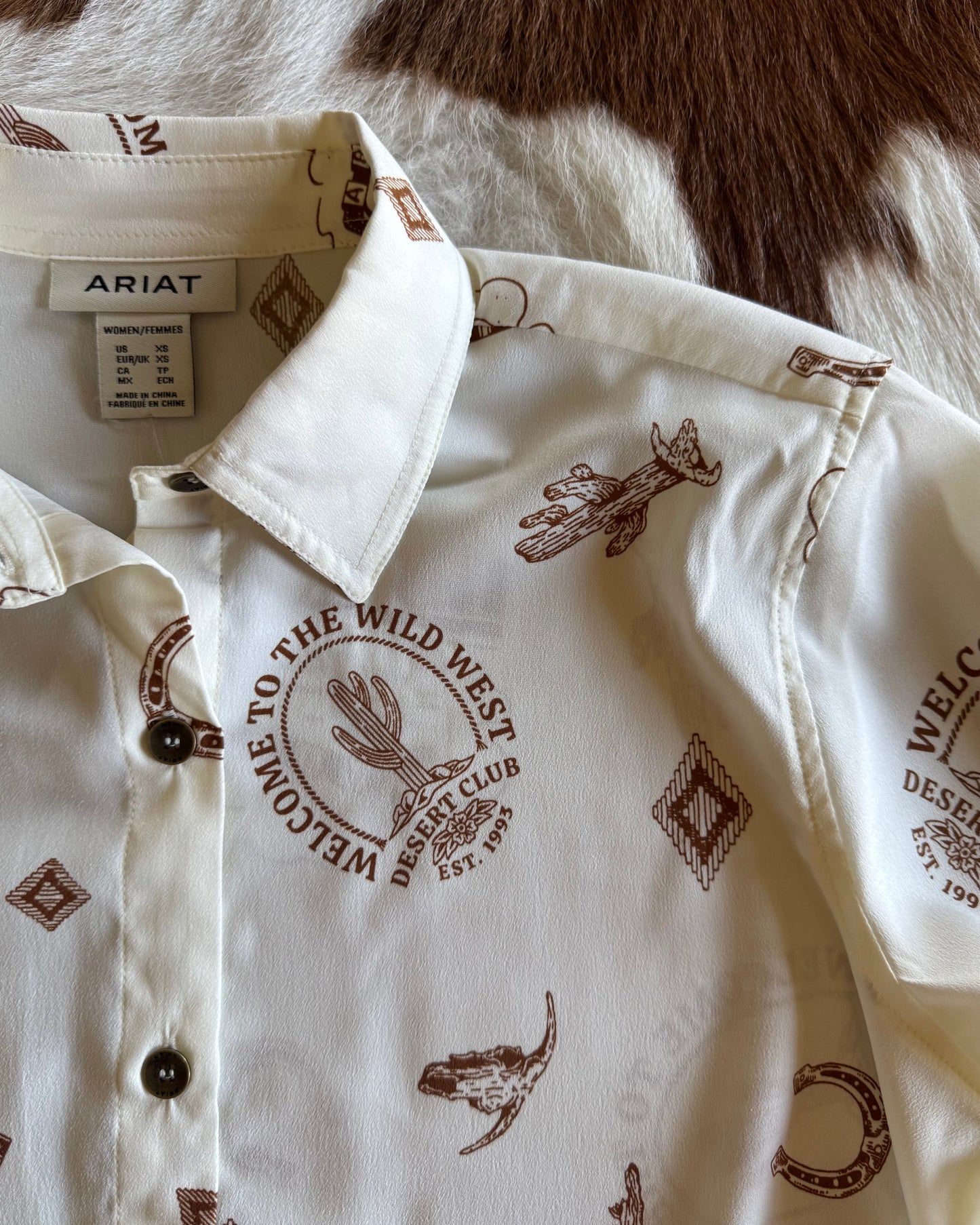 Close up of Homestyle Shirt on cowhide background