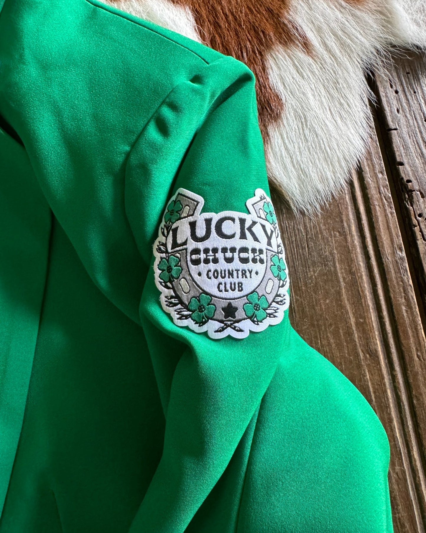 Lucky Chuck Country Club Patch on arm of blazer