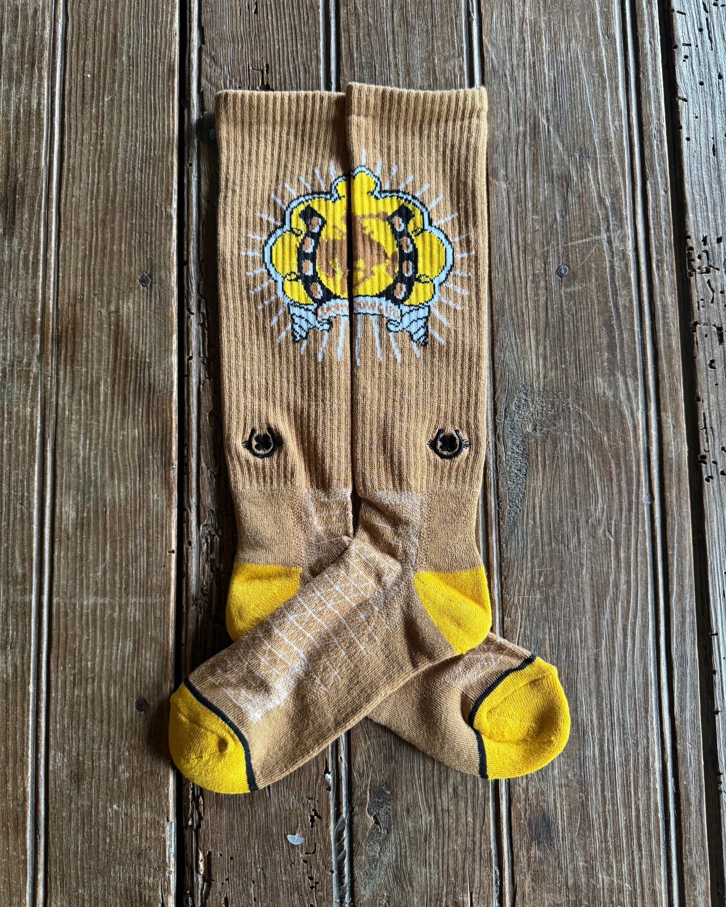 Lucky Bucking Cowgirl Performance Socks (Tan) on rustic wood background
