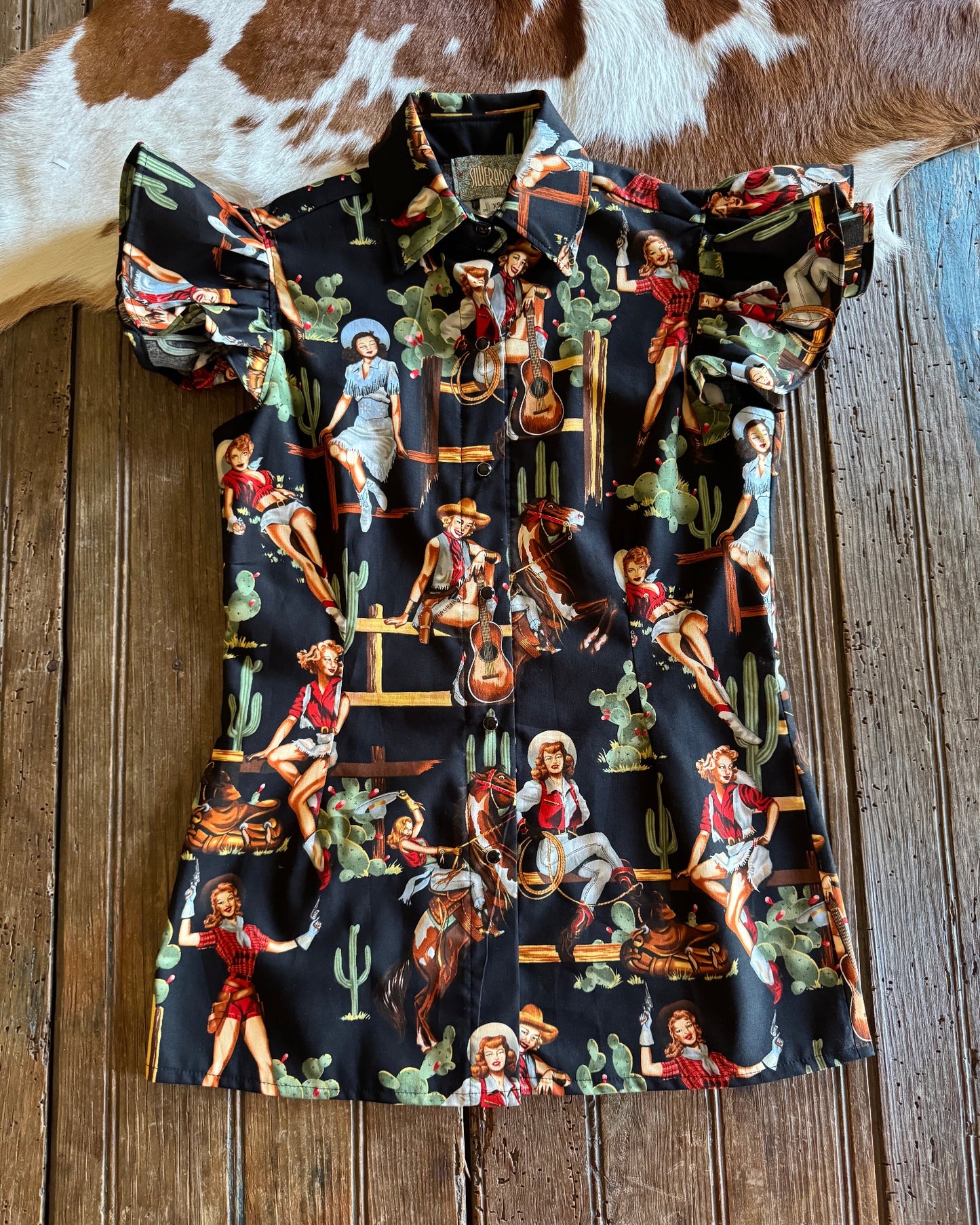 Blake Shirt (Cowgirl Pinup in Black) on rustic wood background