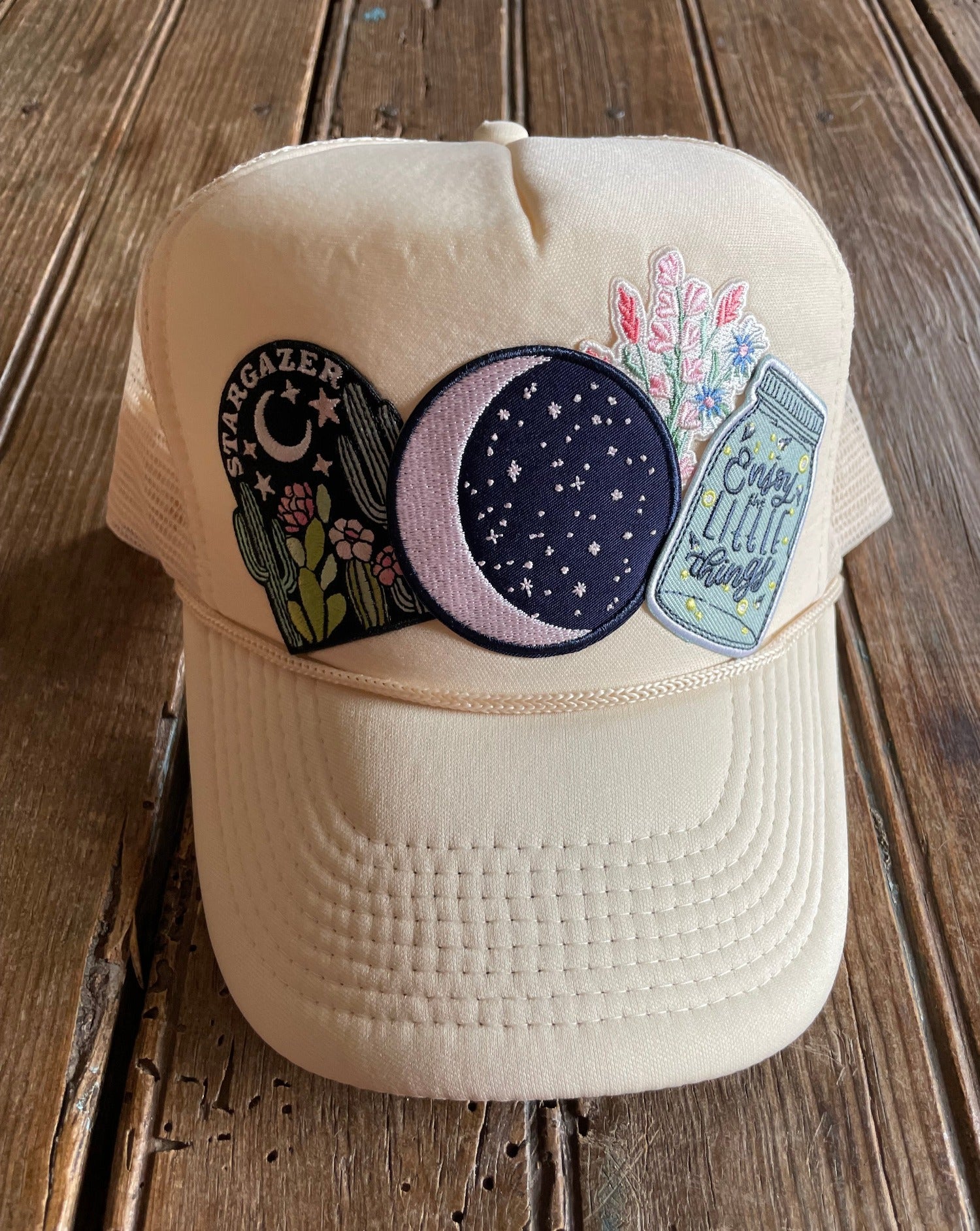 cream foam trucker hat with patches