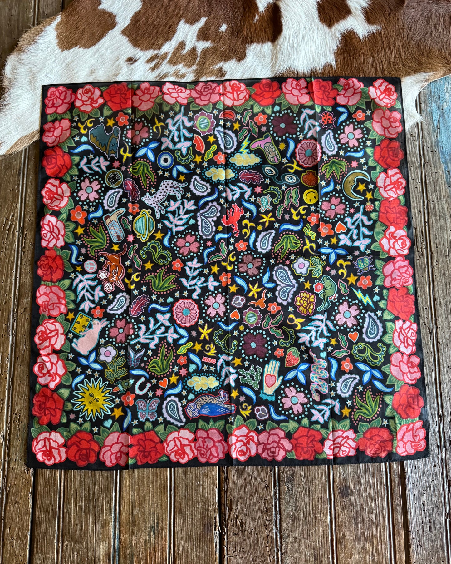 Rose Ranch Shorty Scarf on rustic wood background