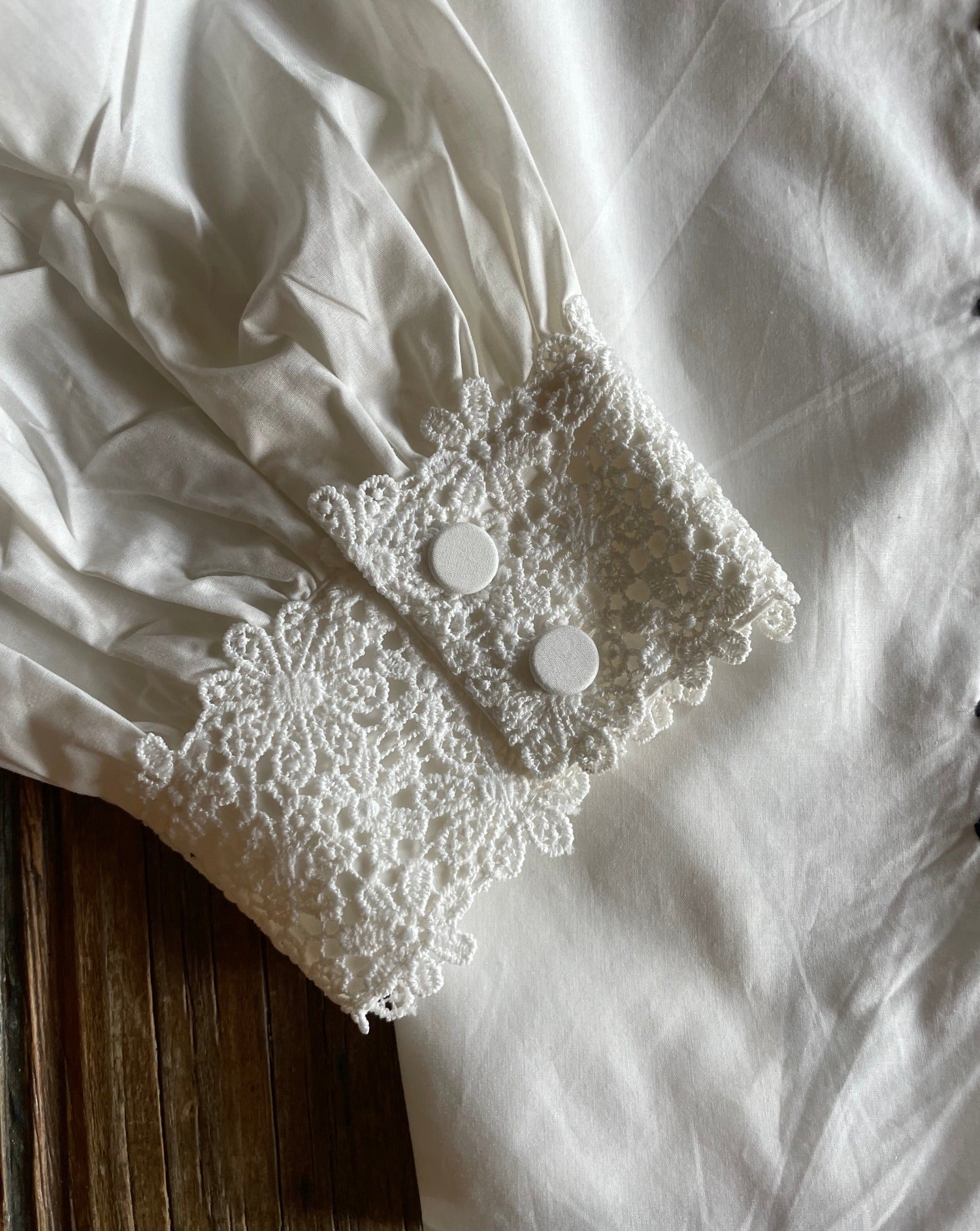 Close up of lace detail on cuff