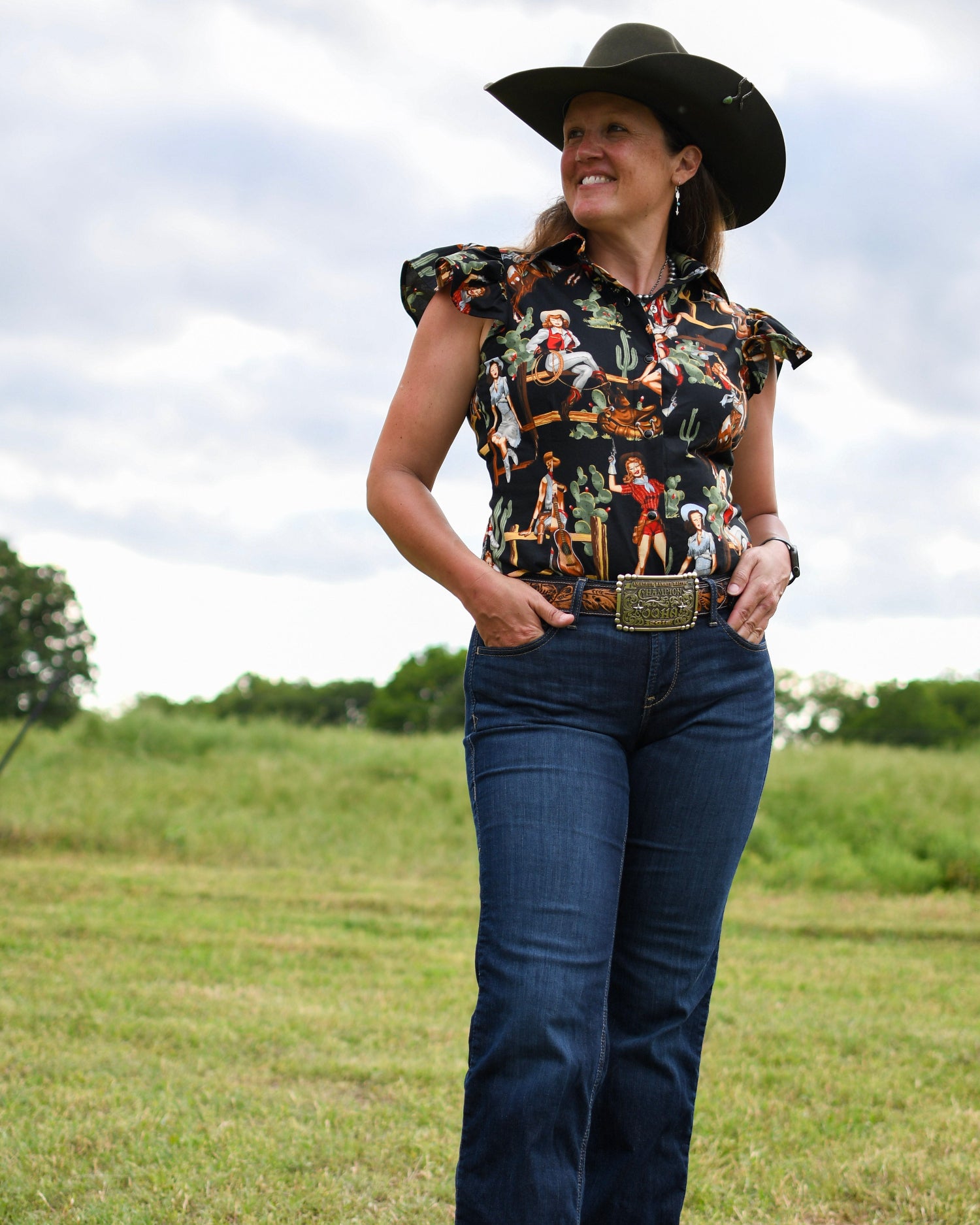 Model with modern western outfit with Blake Shirt (Cowgirl Pinup in Black) in field