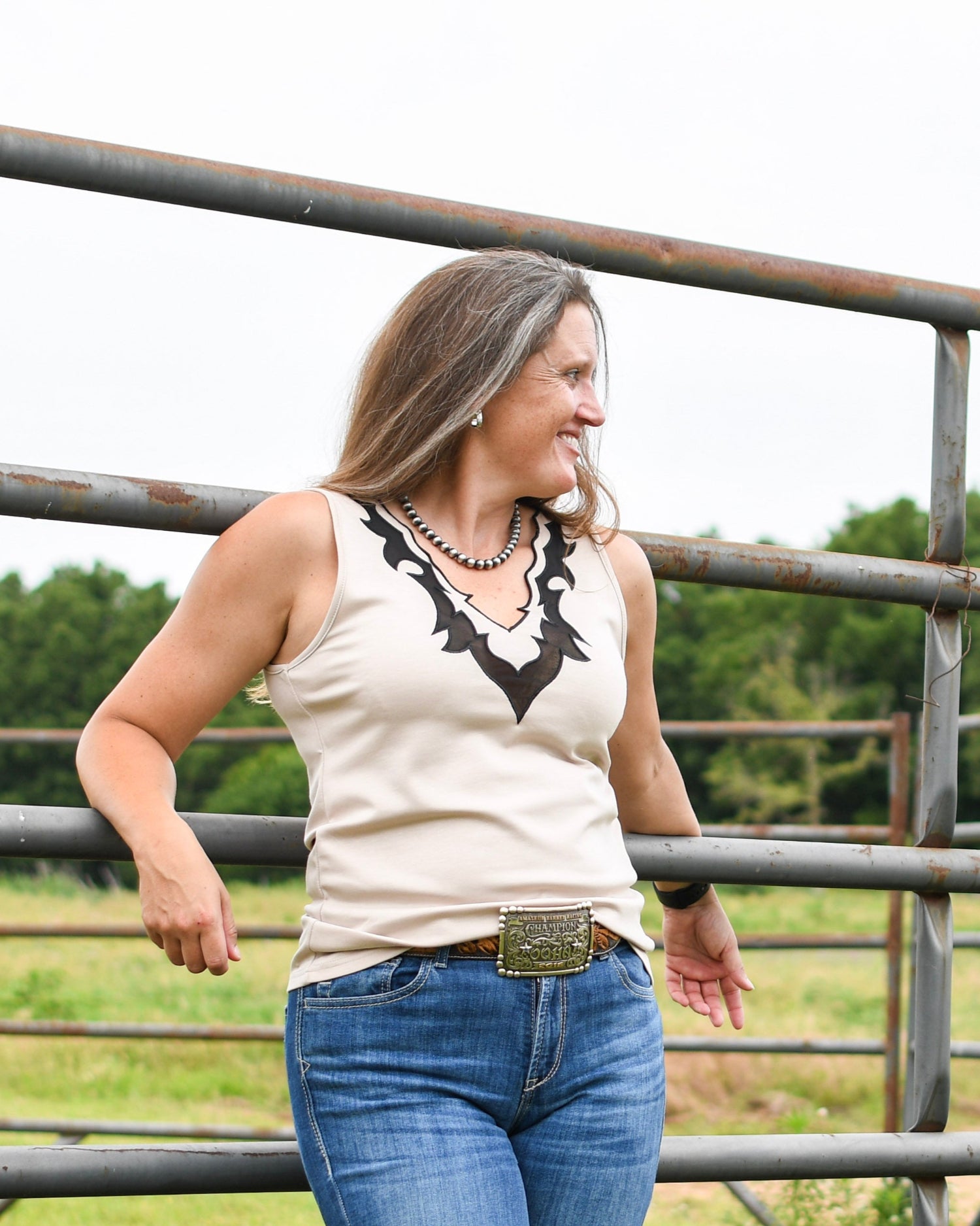Llano tank on model leaning on fence