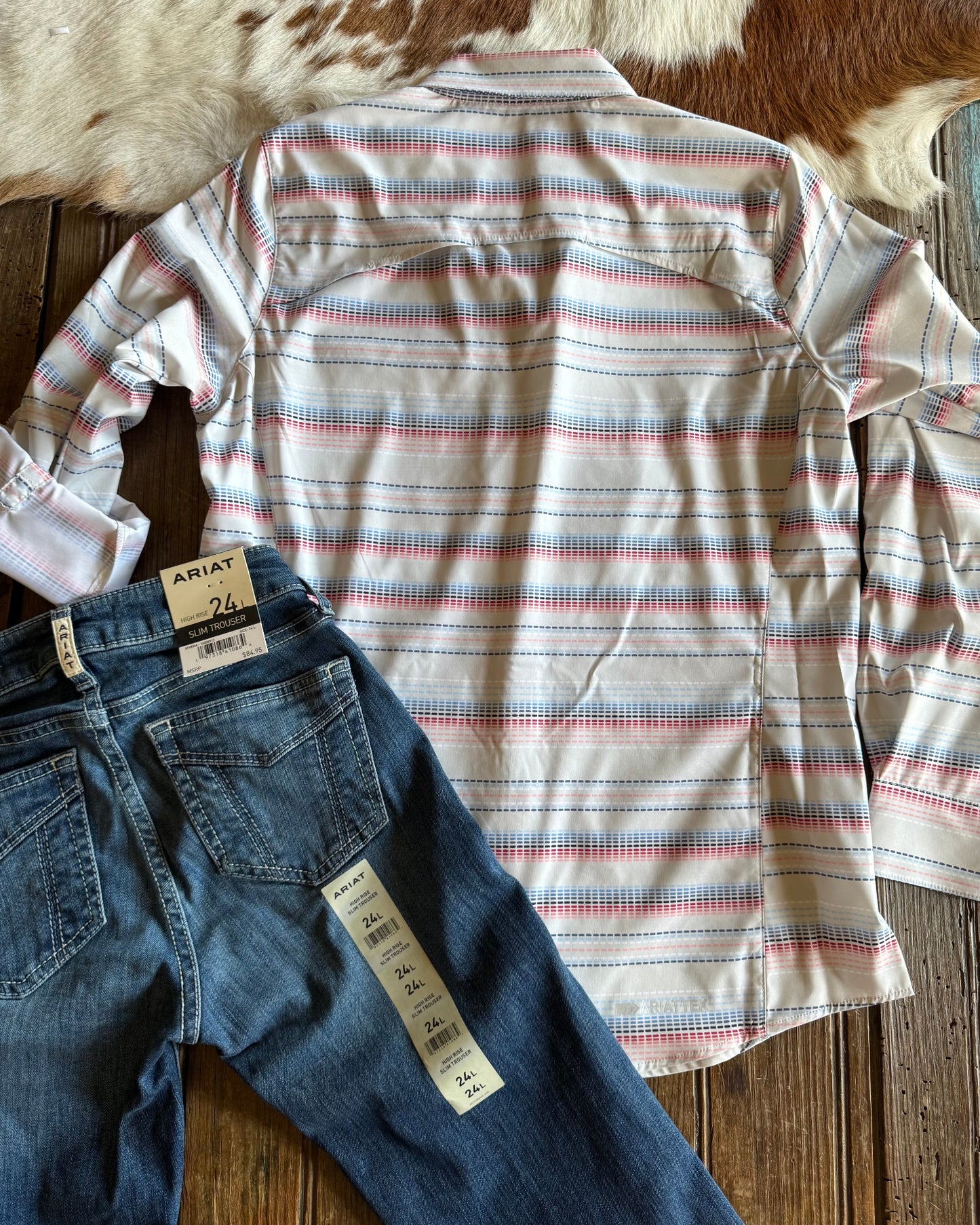 Back of stitch stripe shirt with jeans on rustic wood background