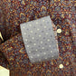 Floral-patterned shirt with a gray pocket square