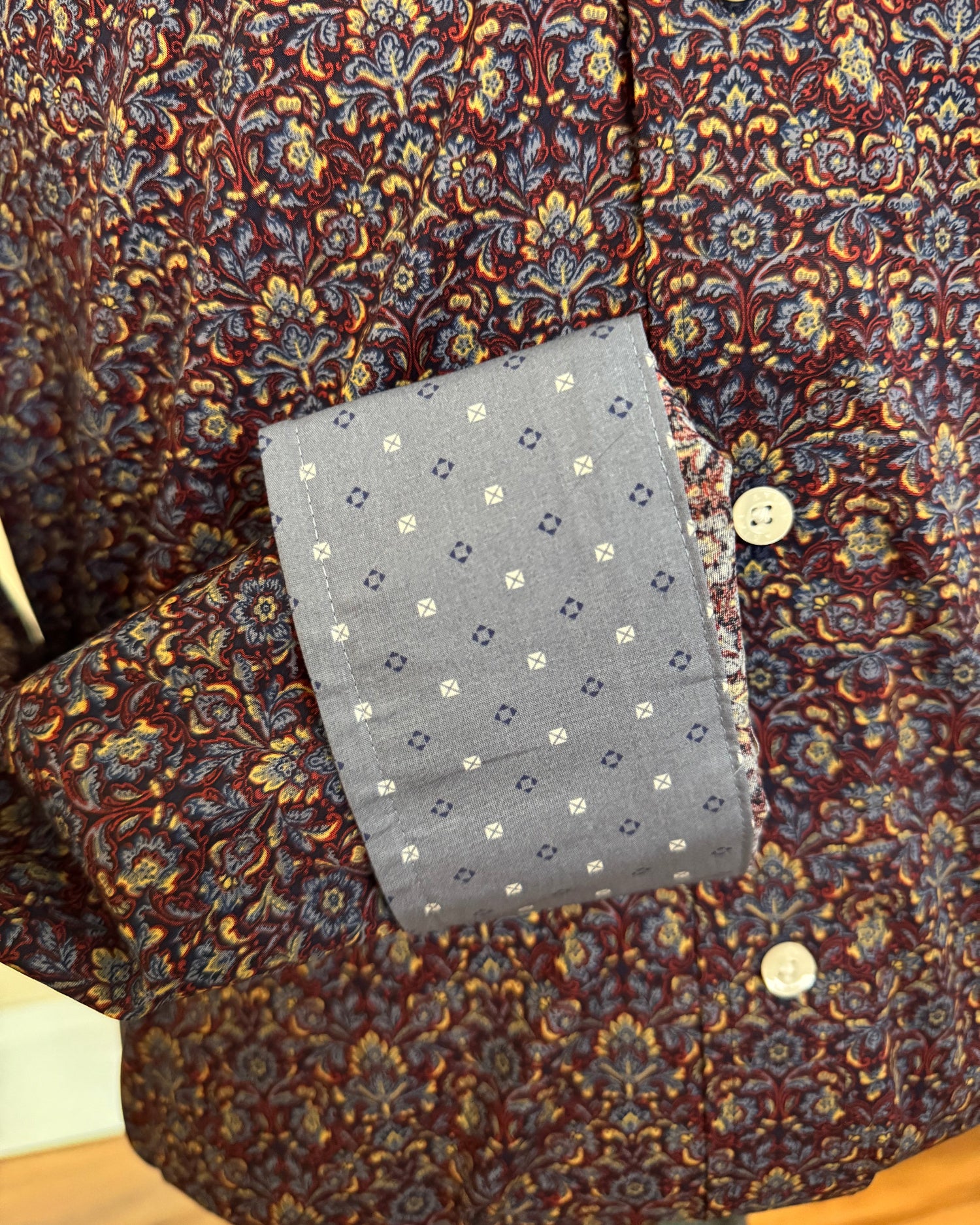 Floral-patterned shirt with a gray pocket square