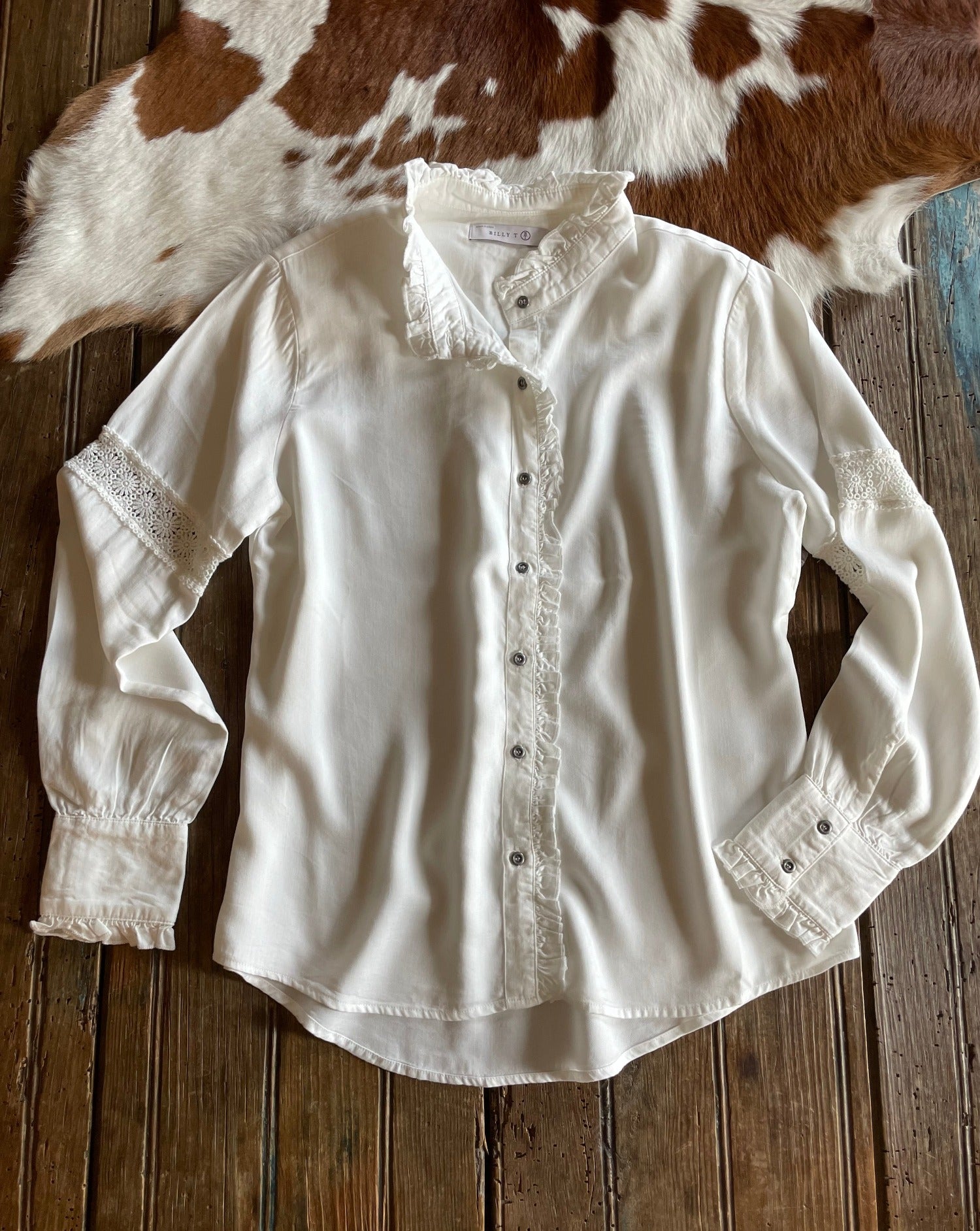 Off white blouse with ruffle details
