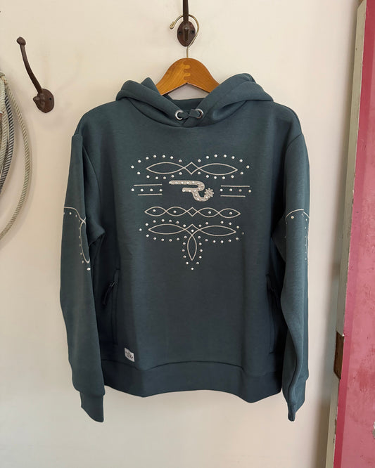 Dark gray hoodie with white designs on a wooden hanger against a white wall.