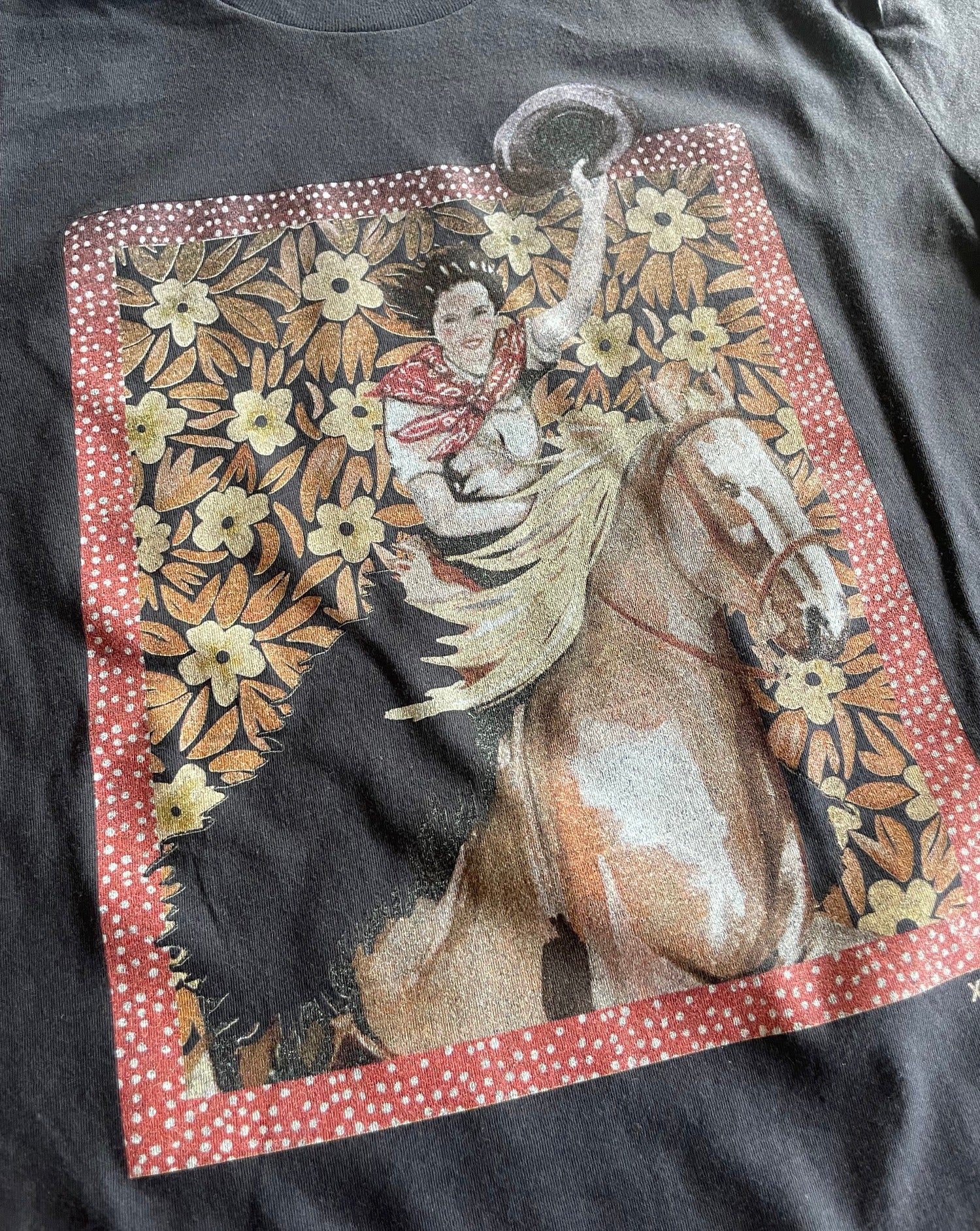 Close up of Cowgirl on Howdy Fade Away Tee