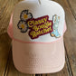 light pink/white foam trucker with patches