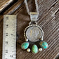 dime necklace with turquoise stones on wooden background with ruler for size 