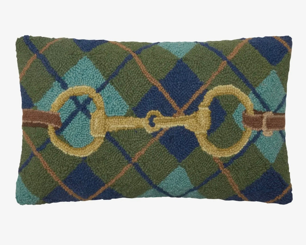 Decorative pillow with plaid pattern and equestrian-themed design on a white background