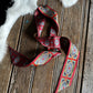 Decorative ribbon with a pattern on a wooden surface