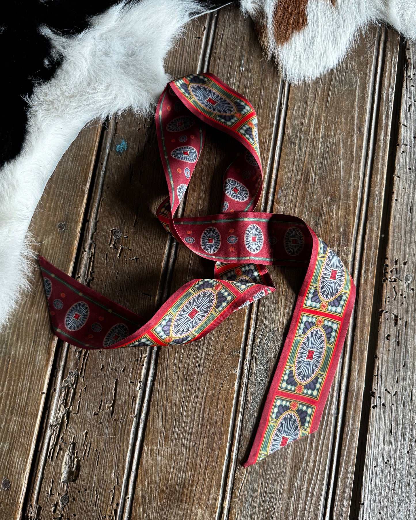 Decorative ribbon with a pattern on a wooden surface