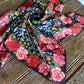 Rose Ranch Shorty Scarf folded on rustic wood background 