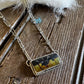 blackjack turquoise necklace on a rustic wooden background