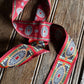 Decorative ribbon with intricate patterns on a wooden surface