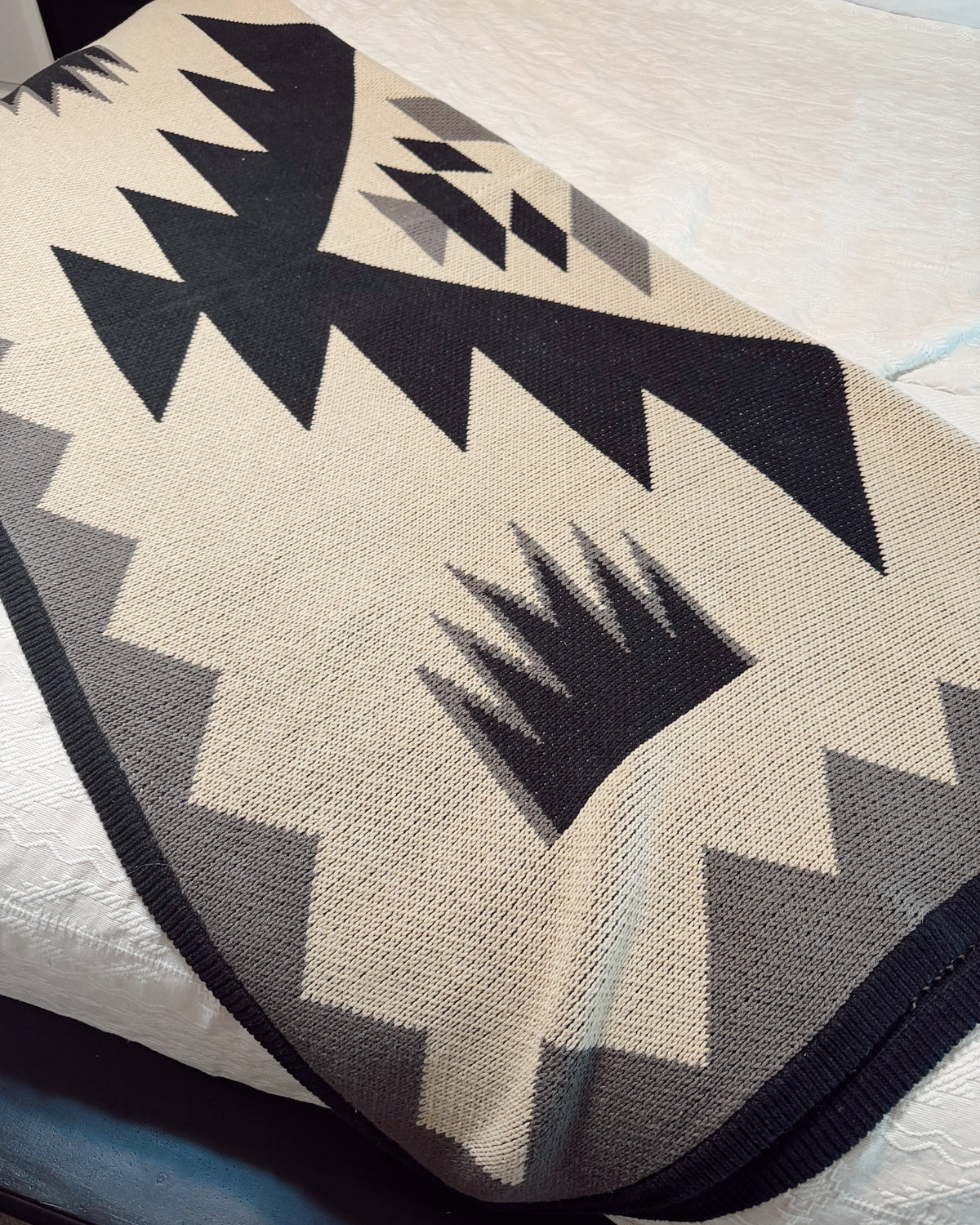 Textile with geometric pattern on a flat surface