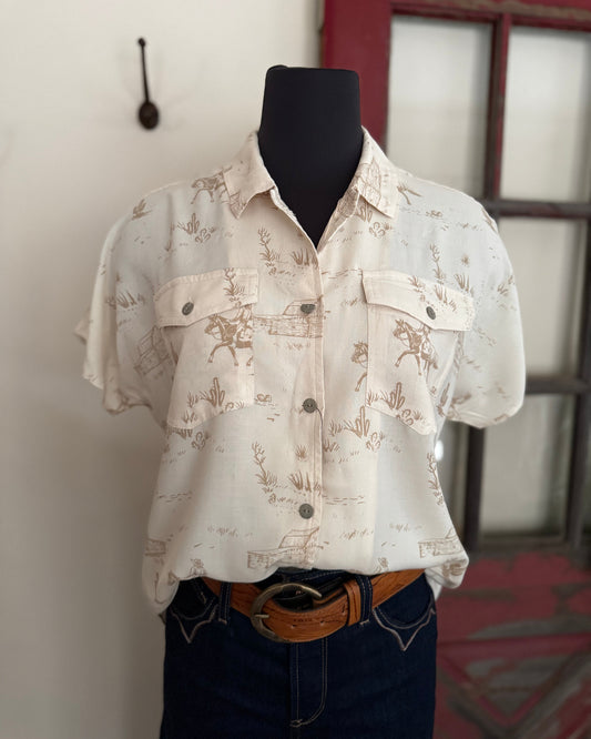 White patterned shirt on a mannequin with a blurred background