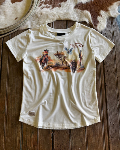 White t-shirt with graphic design on a wooden surface