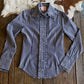 Ivy Pinstripe Frill Shirt on rustic wood and cowhide background 