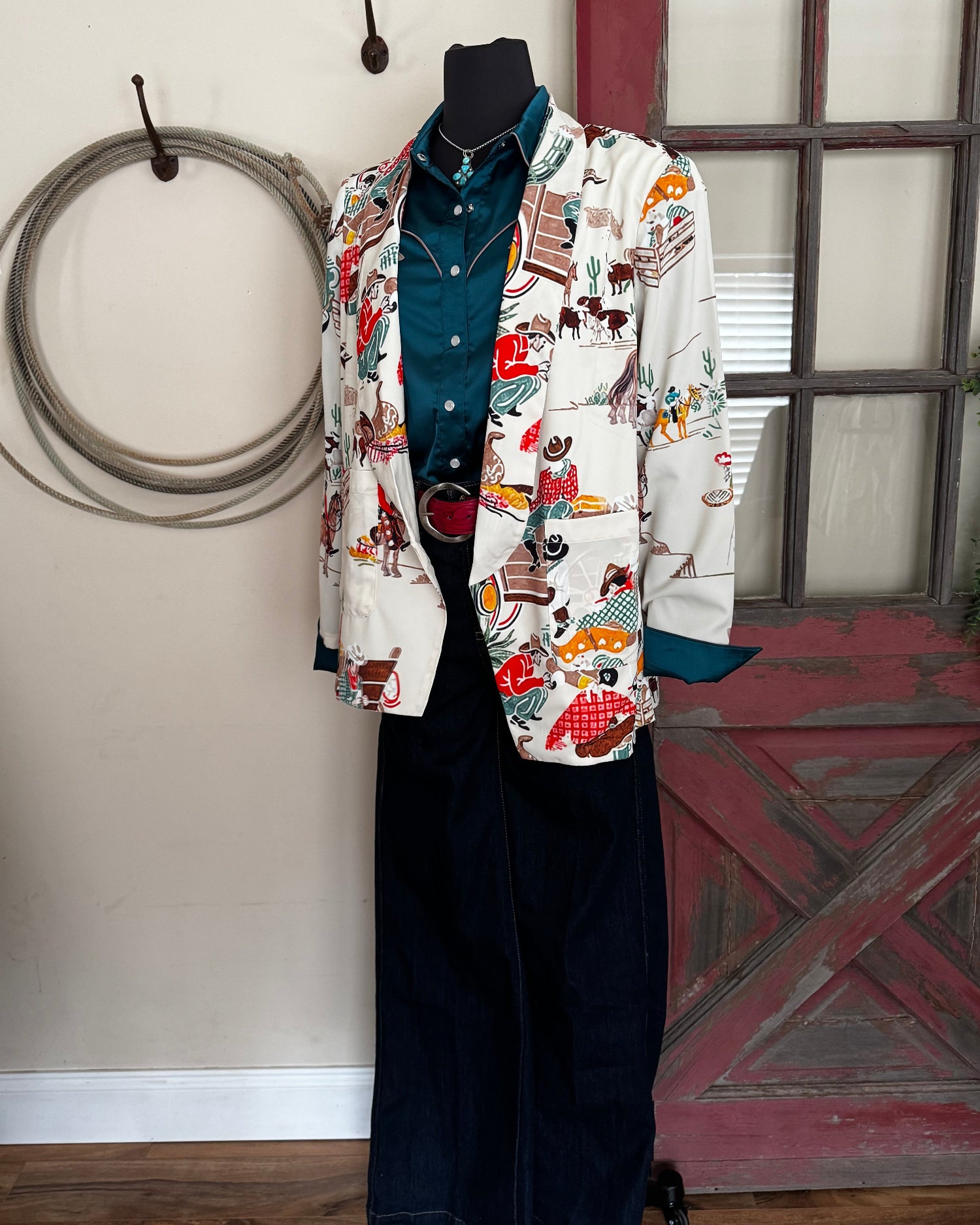 Outfit featuring  printed blazer with a red barn door in the background