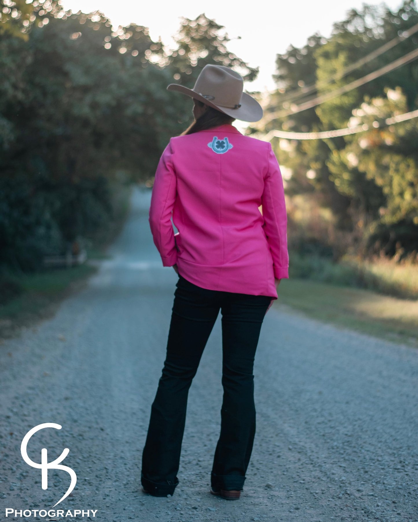 Back of One Pretty in Pink Cowgirl Blazer on model