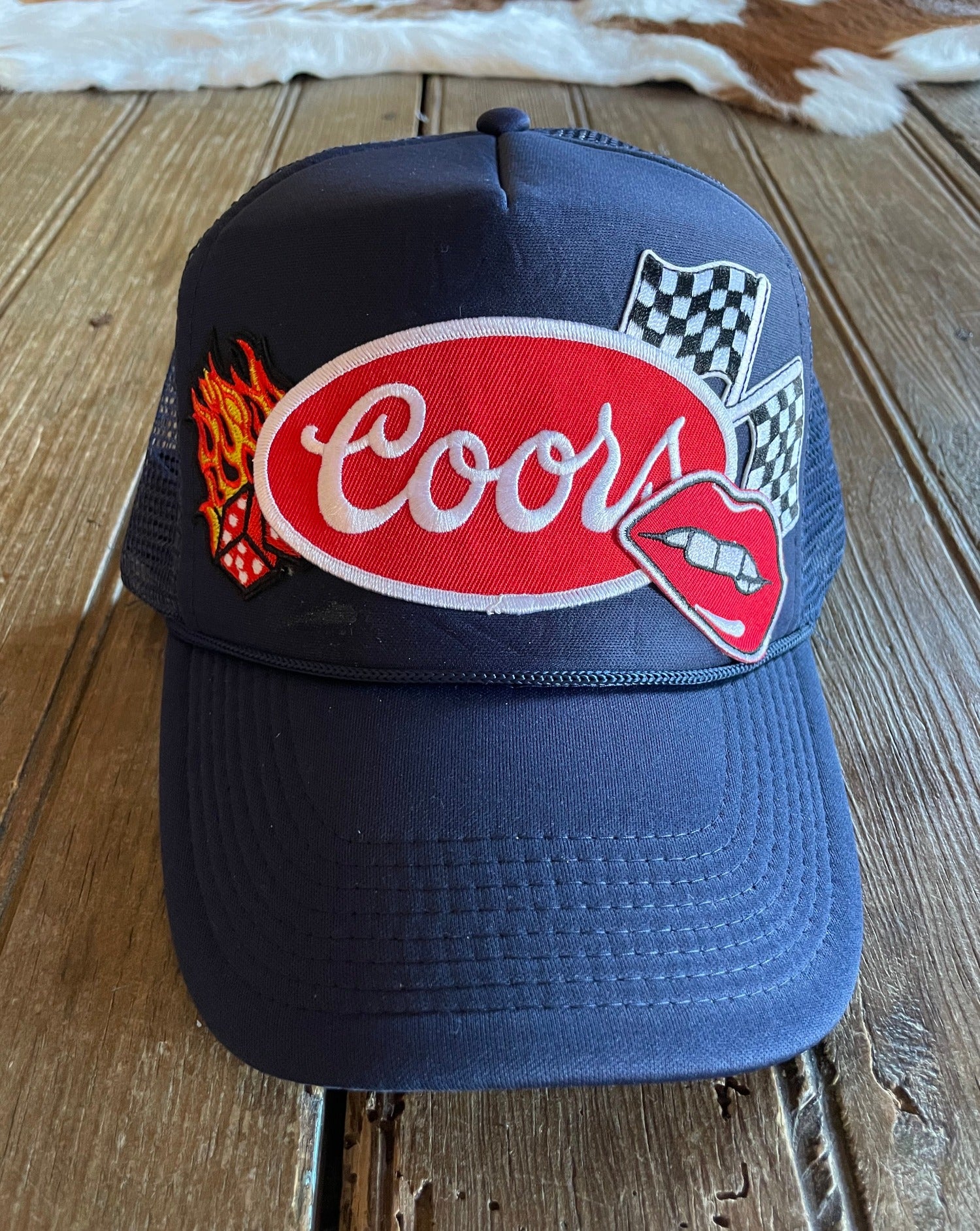 Navy foam trucker hat with Coors patch