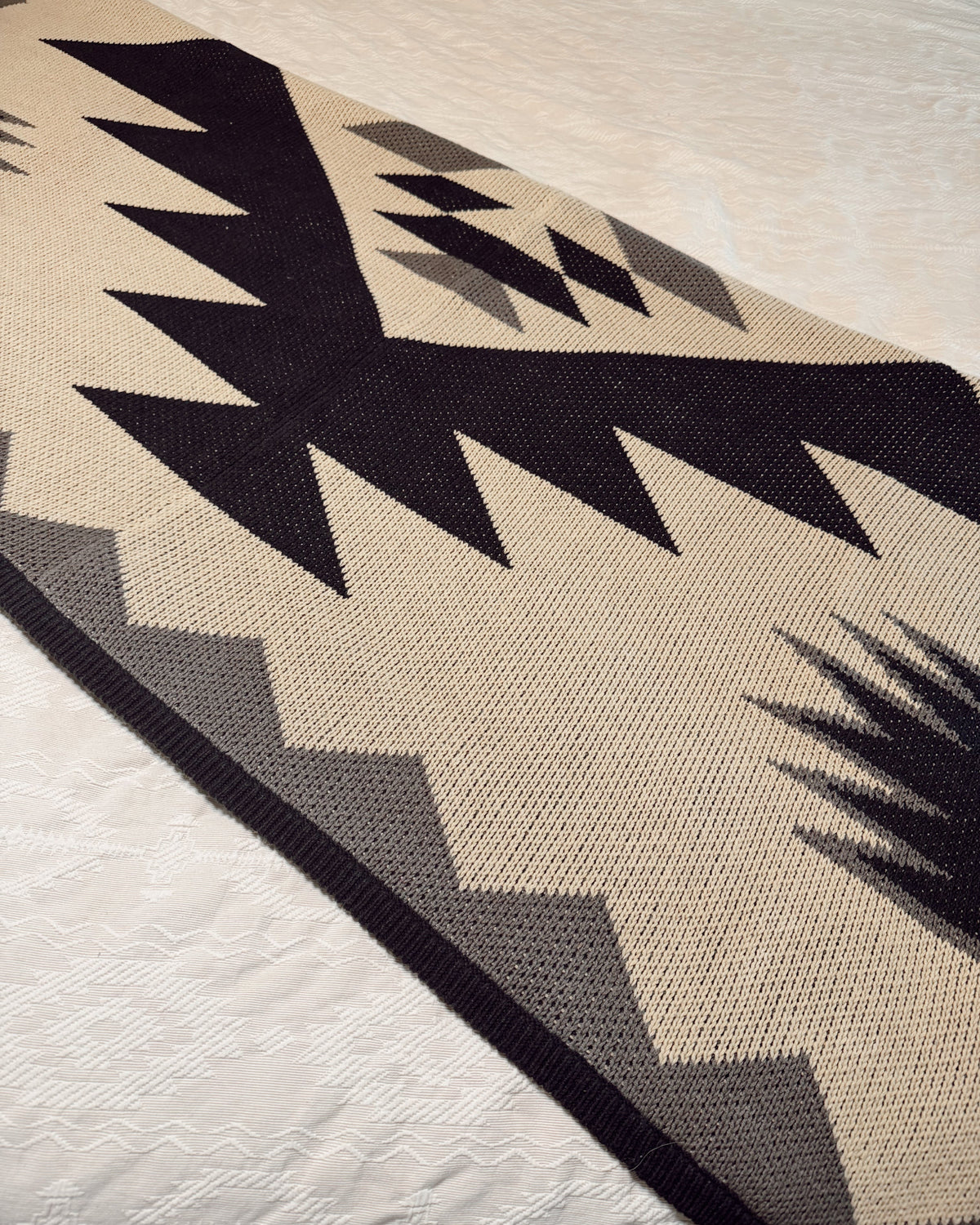 Rug with geometric pattern on a light-colored floor