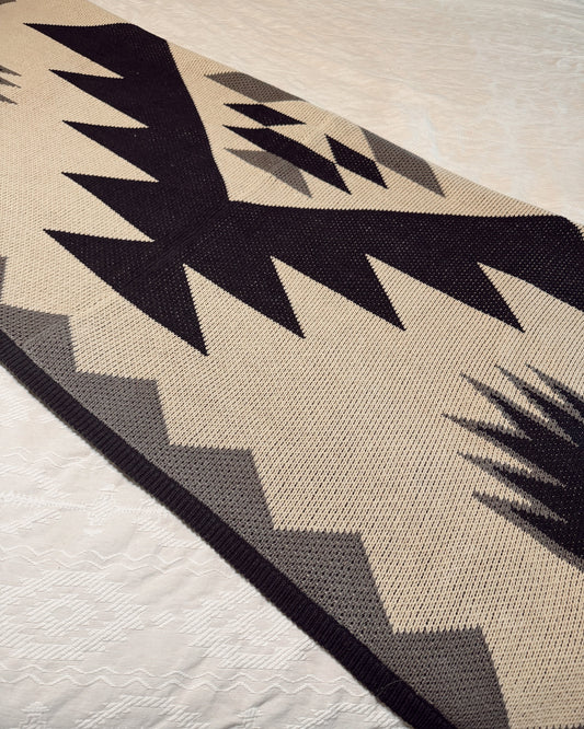 Rug with geometric pattern on a light-colored floor