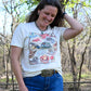 10 Gallon Hat graphic tee on model 