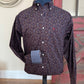 men's patterned shirt on mannequin with rustic background
