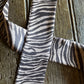 Zebra print fabric on a wooden surface
