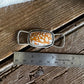Fawn Jasper twilly slide on a wooden background with a ruler 