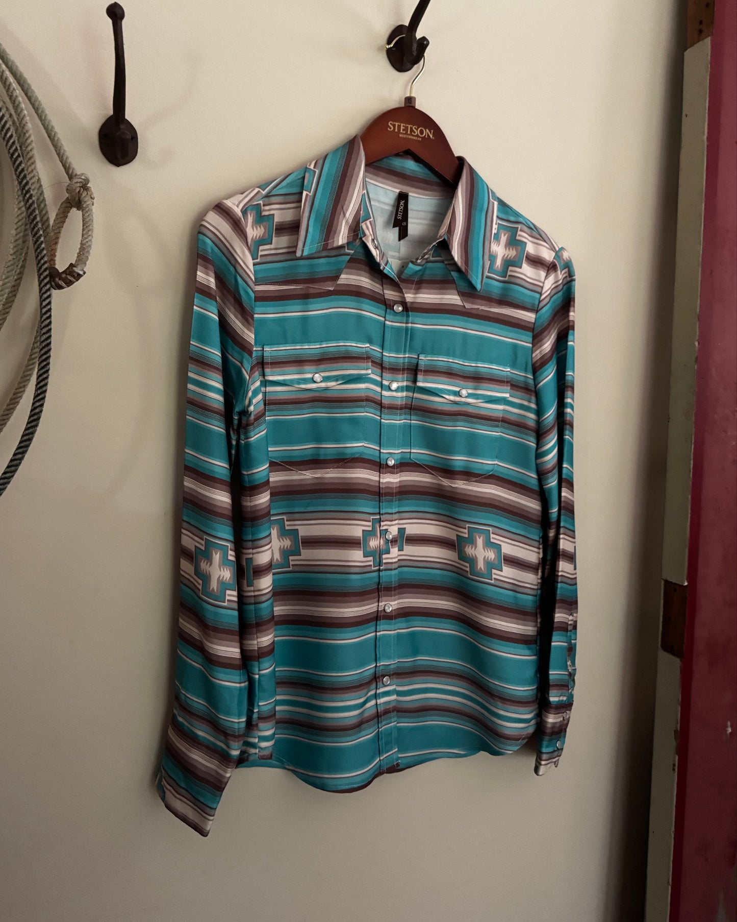 Striped shirt with pattern on a white surface
