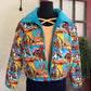 Colorful quilt coat with cartoon characters on a mannequin against a door background