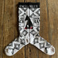 Cactus Alley - Broke A$$ Ranch Performance Socks (Black/White) on rustic wood background