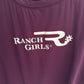Close-up of a purple garment with 'Ranch Girls' logo