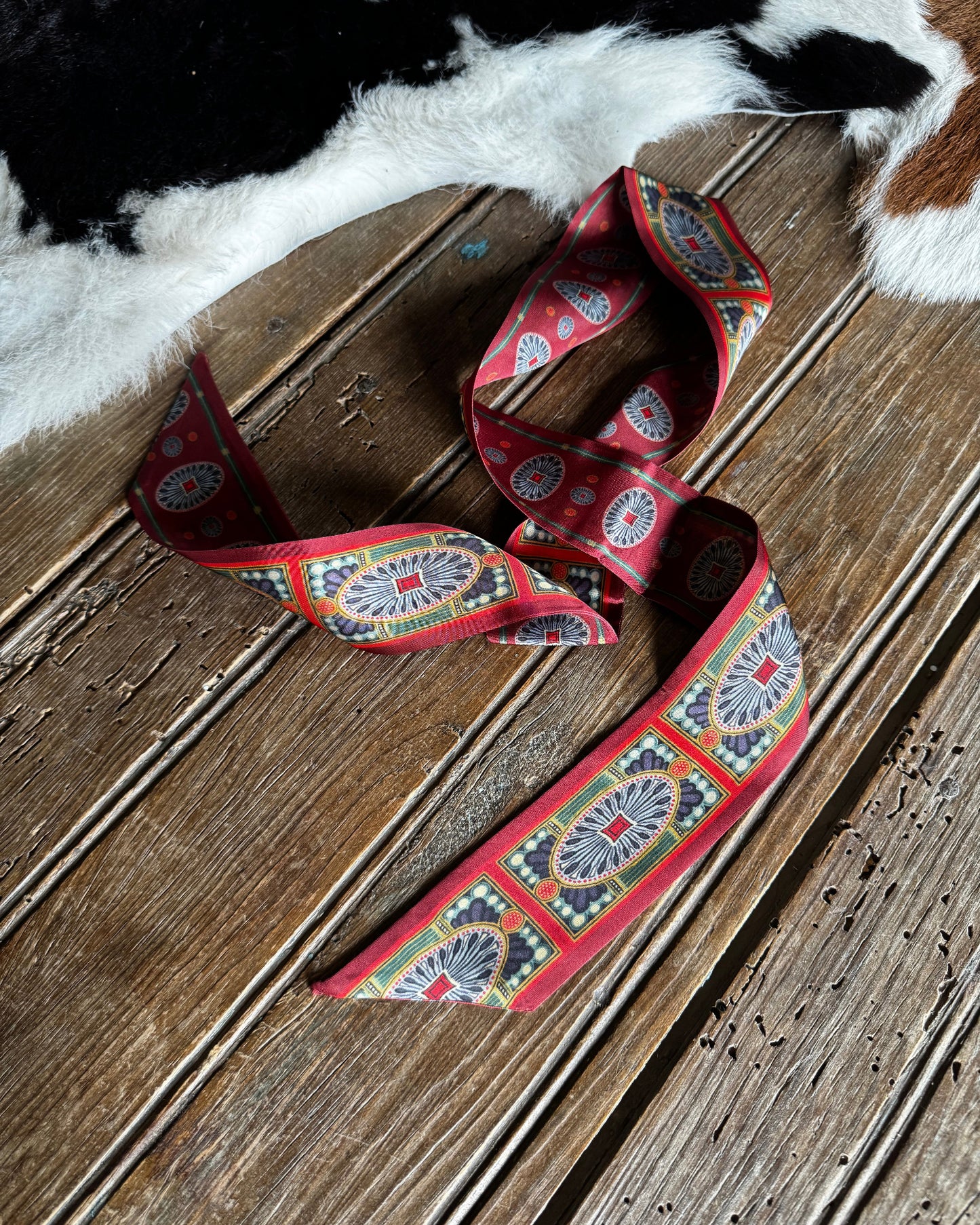 Decorative ribbon with a pattern on a wooden surface
