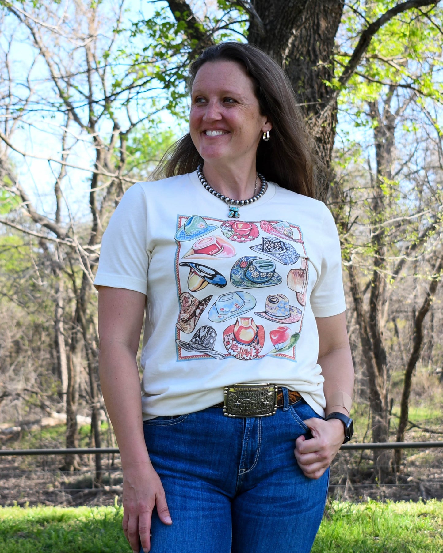 10 Gallon Hat Tee on model with wooded background 