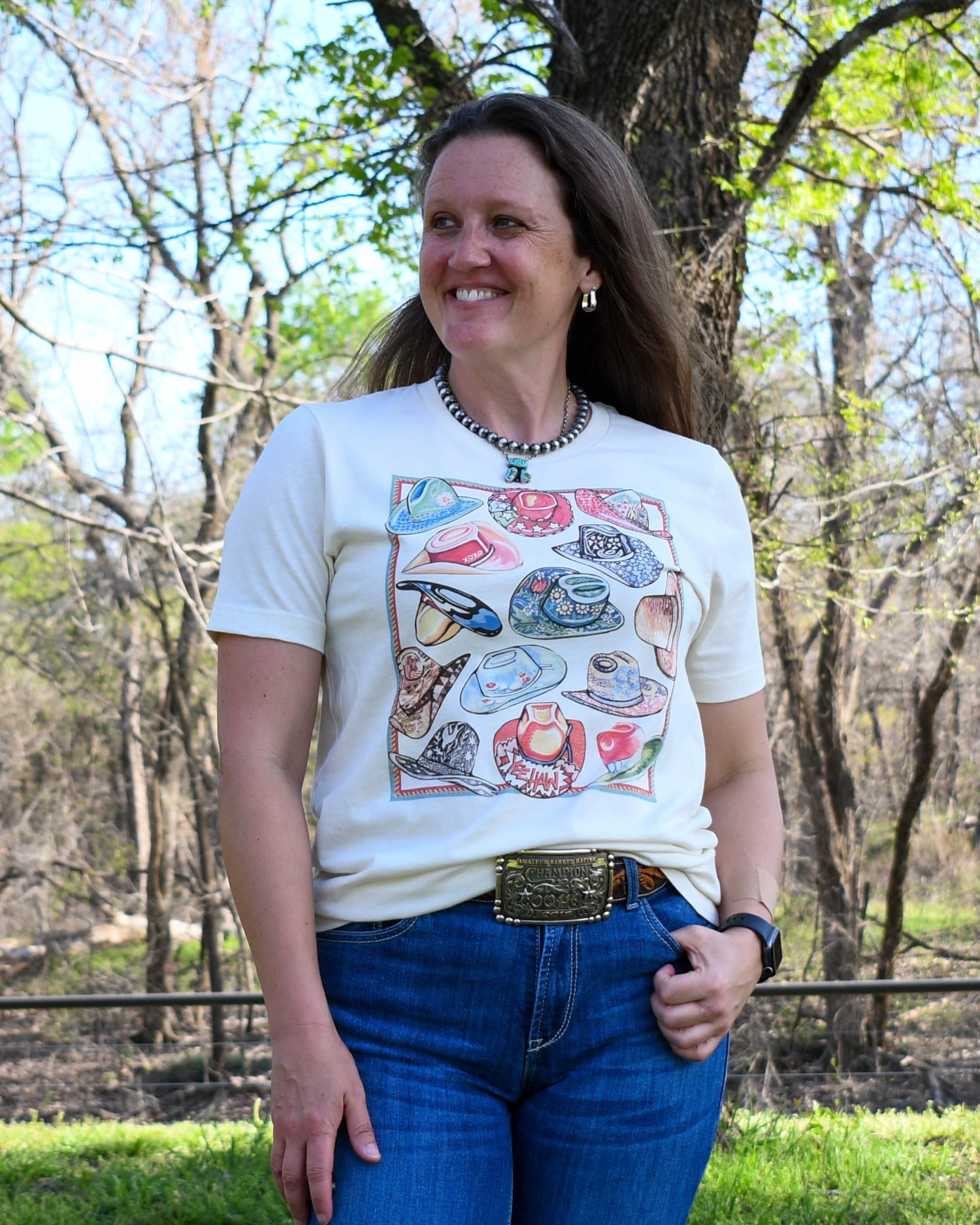 10 Gallon Hat Tee on model with wooded background 