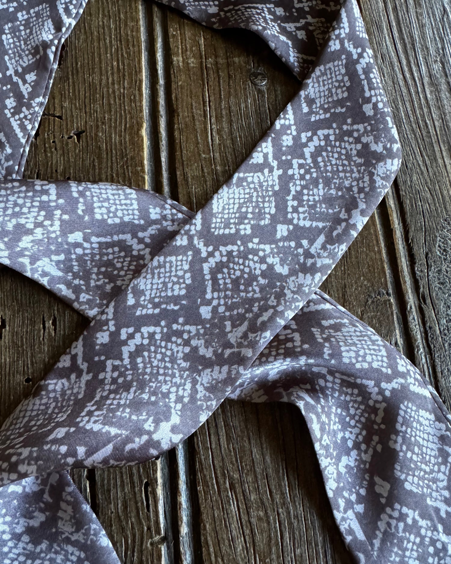 Patterned fabric on a wooden surface