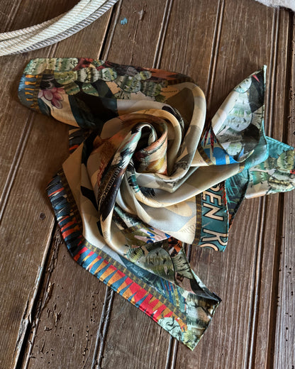 Colorful scarf with patterned design on a wooden surface
