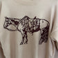 Beige sweater with a horse design on a hanger