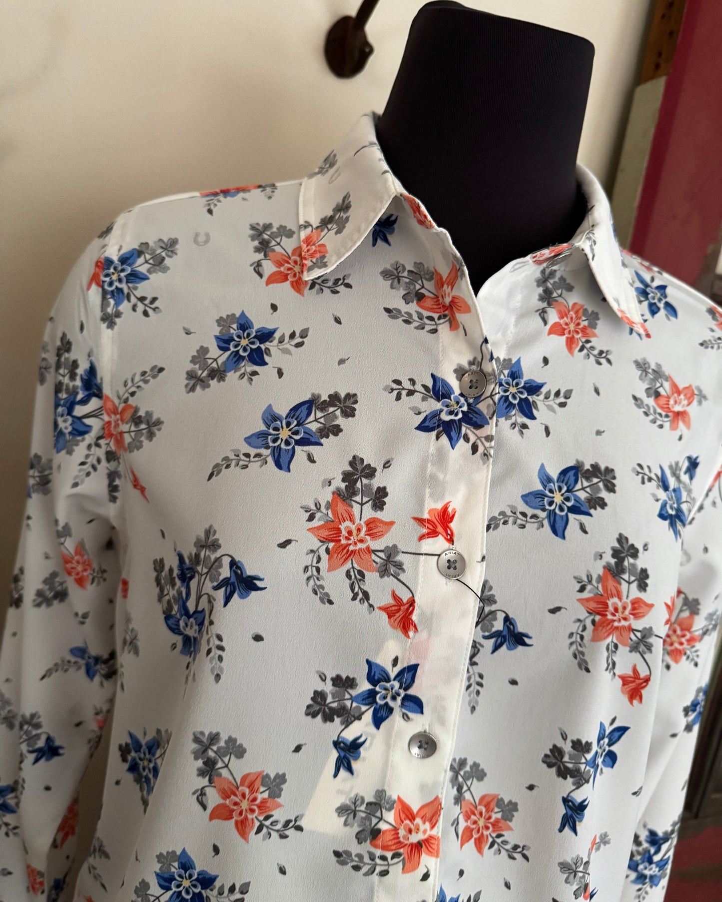 Floral-patterned garment on a white surface