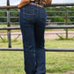Ophelia Perfect Rise Trouser Jeans on model leaning on fence