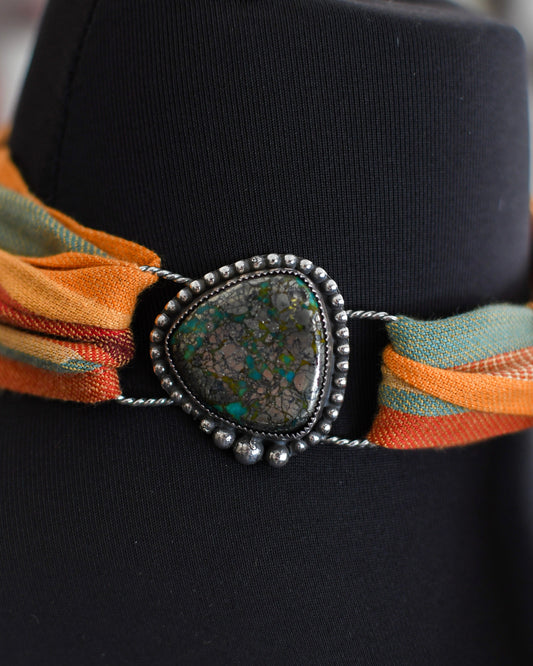 close up of Nacozari Turquoise Twilly slide on mannequin