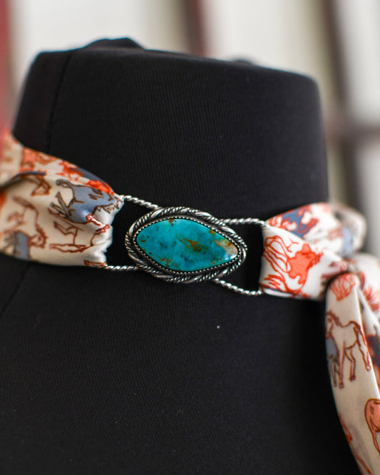 Turquoise twilly slide on mannequin with white background